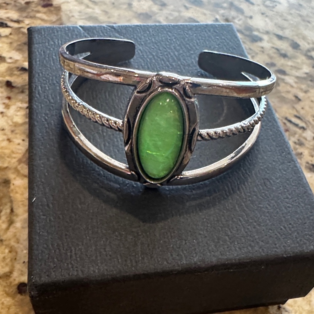 Elegant Silver Bracelet with Green Stone